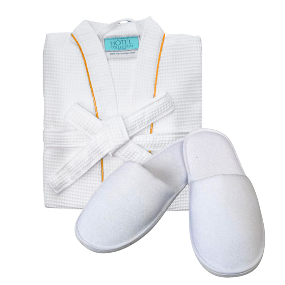 White folded bathrobe and White Closed Toe Hotel & Spa Slippers