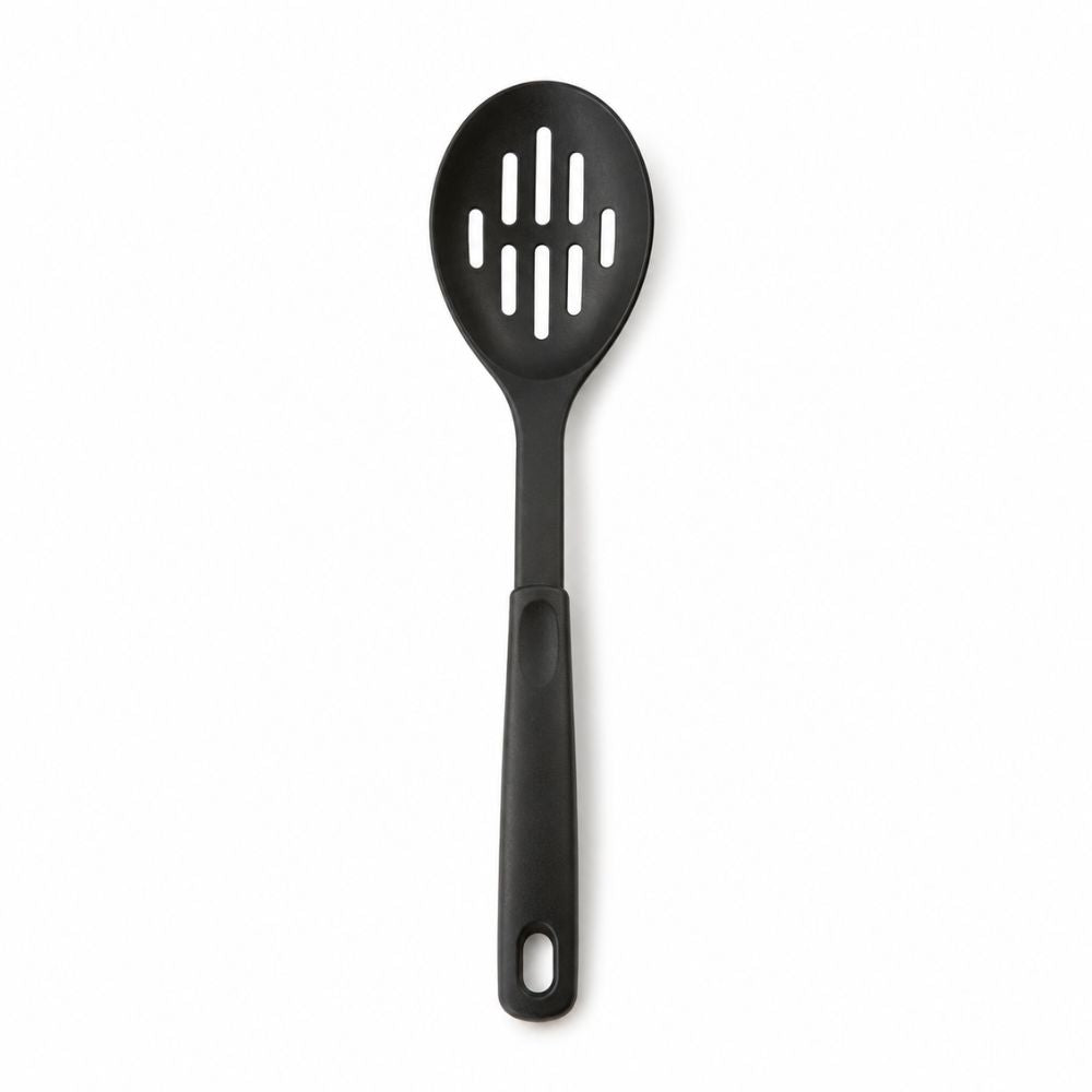 Black slotted serving spoon with oval head and drainage openings for serving vegetables, pasta and everyday meals.