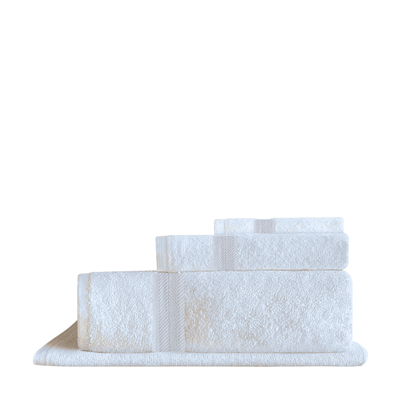 Complete 4-piece Turkish cotton towel set with superior absorbency and elegance, designed for upscale hospitality environments.