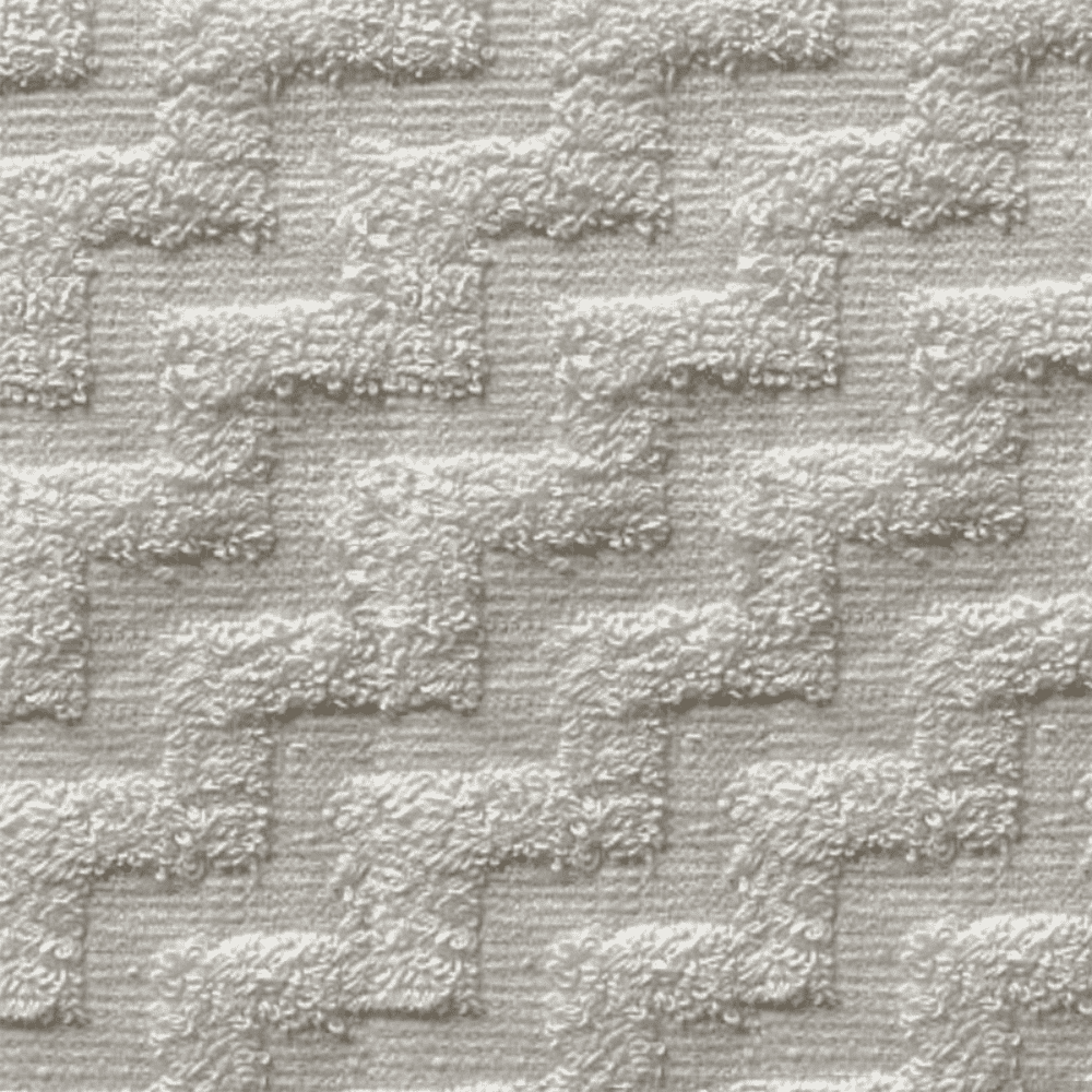 Jacquard pattern towels for hospitality textured white towel closer view