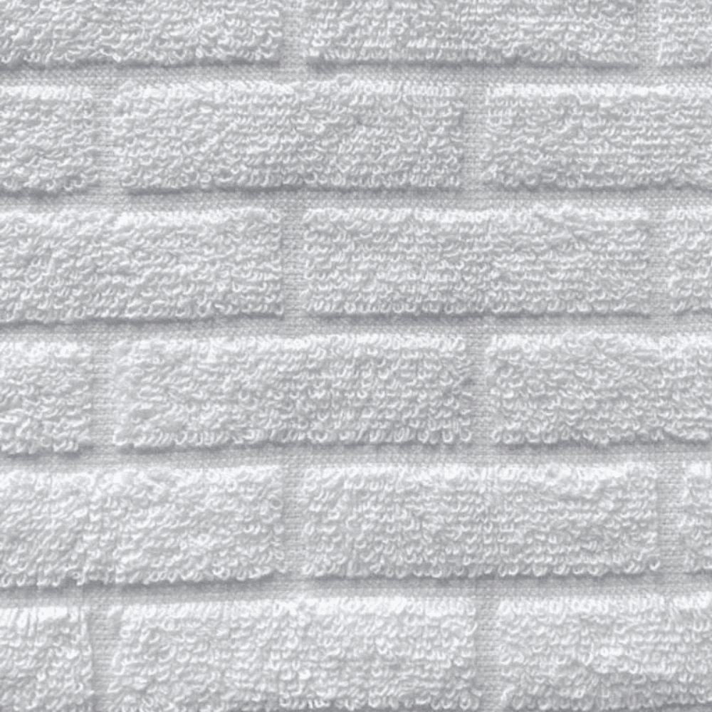 Close-up of cotton bath sheet fabric showing short loops designed for durability, absorbency, and quick drying