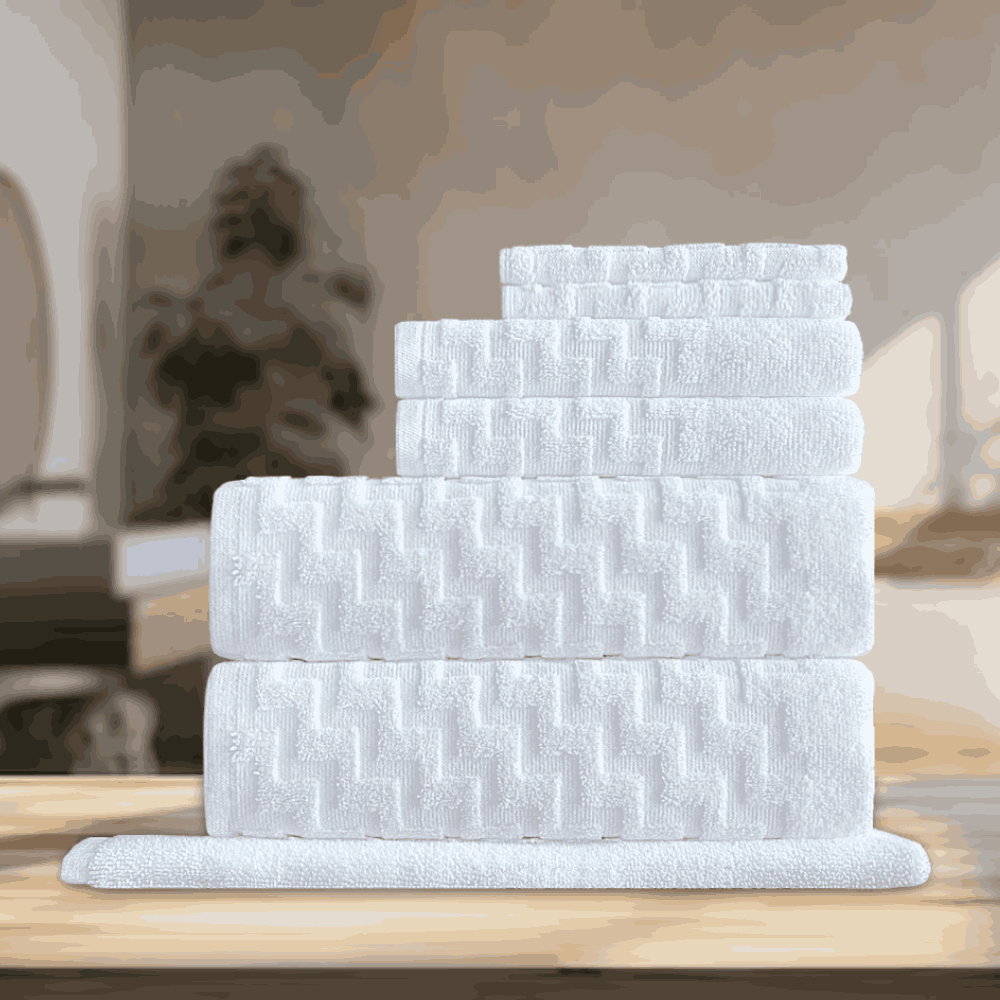 Premium-quality hotel towels available in various quantities, tailored to meet the needs of hotels, Airbnbs, and vacation rentals seeking long-lasting and quick-dry solutions. White folded BWS SERIES Towel Set - Premium 7 pc Set.