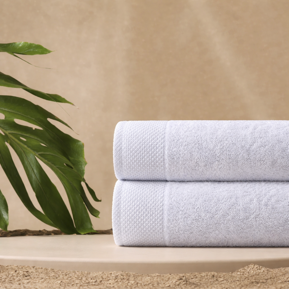 Thick, absorbent cotton bath towels designed to deliver a cozy, spa-like drying experience at home