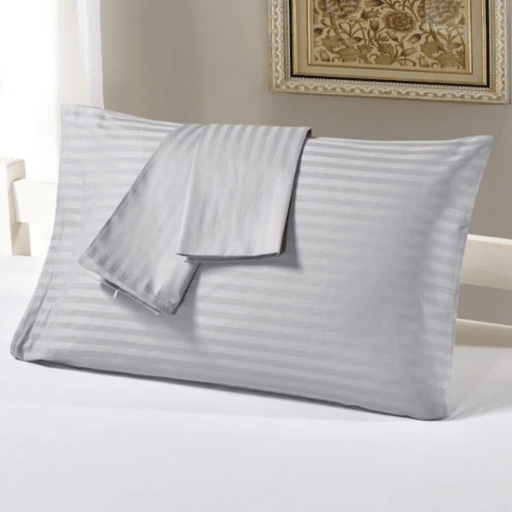 Premium gray striped pillowcase on a soft hotel bed, perfect for hospitality use.