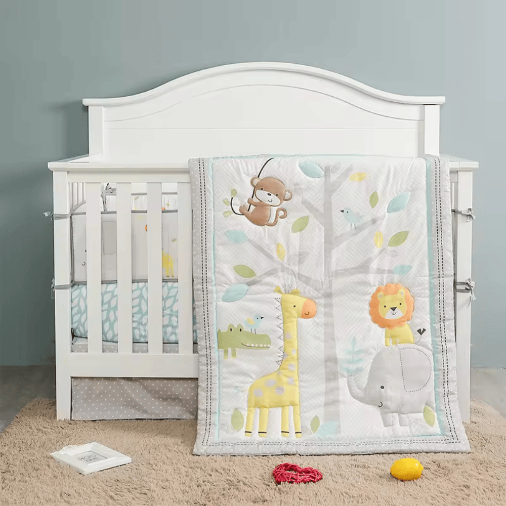 White crib with colourful animal-themed blanket Cooling duvet with lightweight materials and decorative patterns, crafted for essential warmth in bedrooms or Airbnb rentals