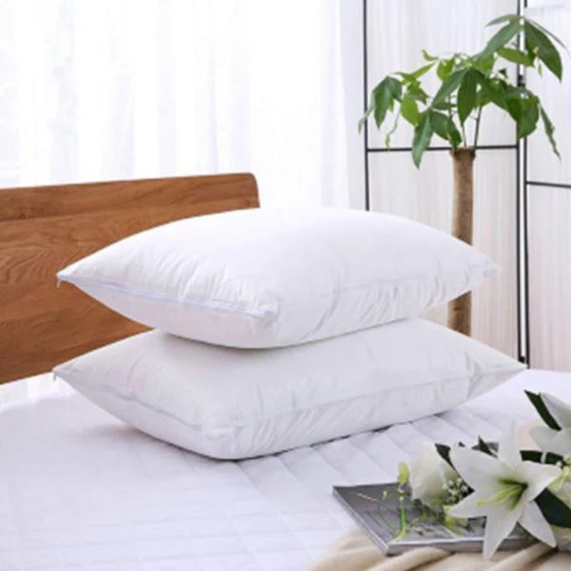 Premium microfiber pillow protector, dust and moisture resistant with secure zipper closure for hygiene and comfort.