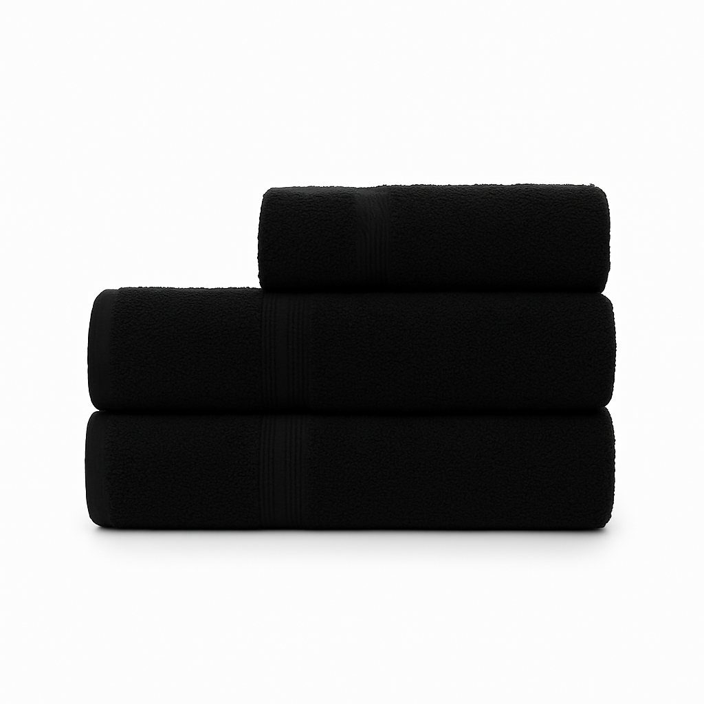 Affordable essential 3-piece black towel set made from 100% combed cotton, soft and durable, perfect for hotels, spas, Airbnbs, or everyday home use