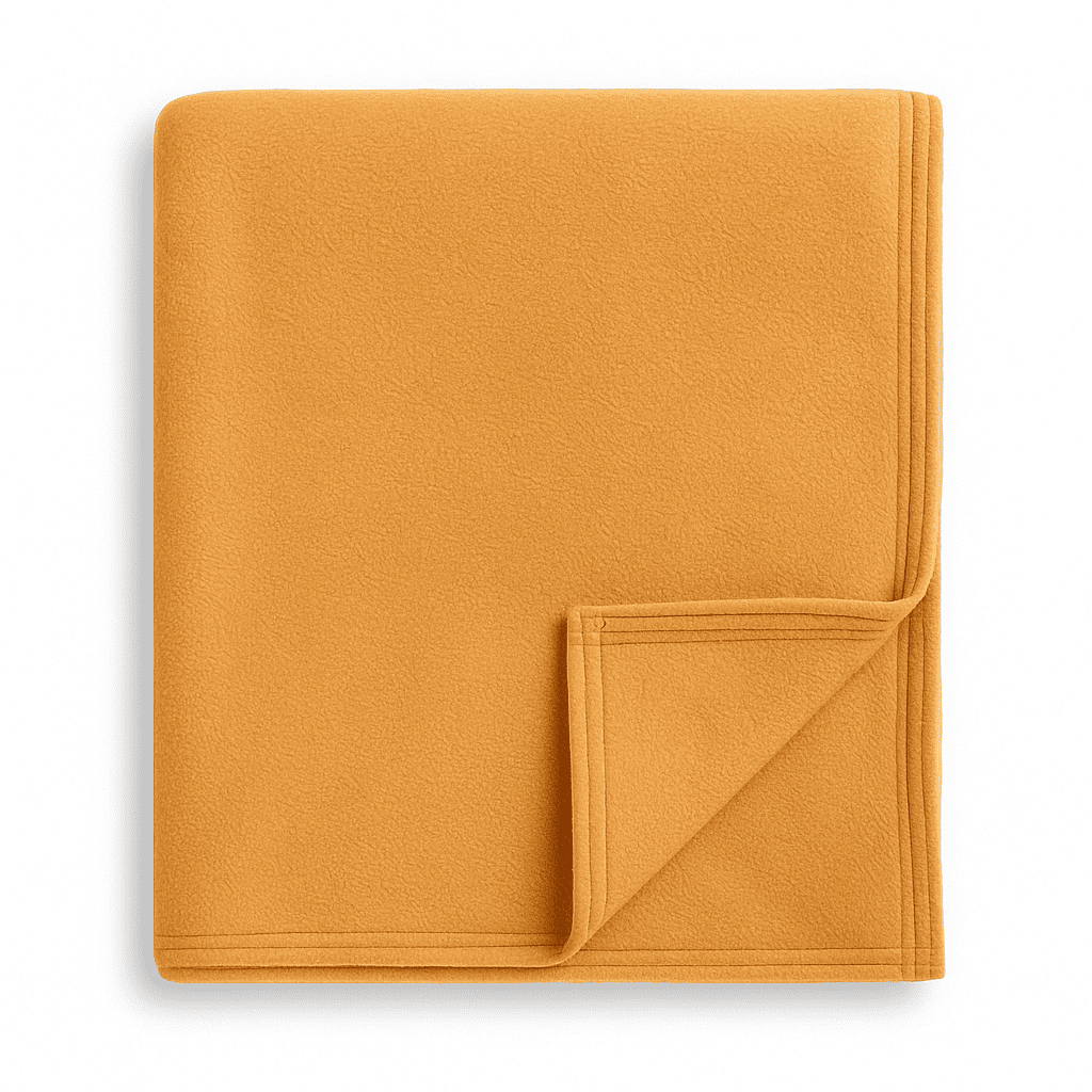 Top view of yellow ocher blanket with smooth edges and plush texture, perfect for hotel rooms, resorts, Airbnb and hospitality use.