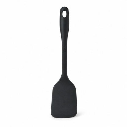 Black T-fal solid turner spatula with long handle for flipping, lifting and serving food while cooking at home.