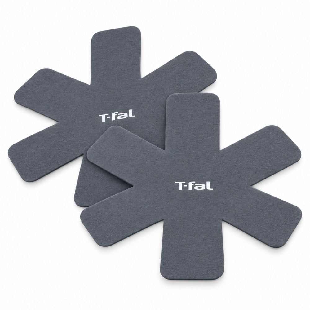 Two grey T-fal felt cookware protectors designed to separate stacked pots and pans and help prevent scratches during storage.
