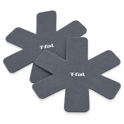 Two grey T-fal felt cookware protectors designed to separate stacked pots and pans and help prevent scratches during storage.