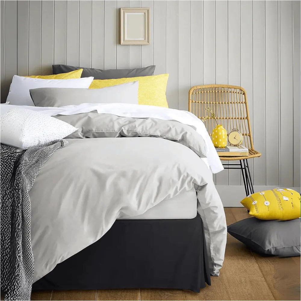 Black bed skirt Multi-colored decorative bed hugger with waterproof and eco-friendly properties, perfect for upscale hotel chain guest rooms or Airbnb rentals