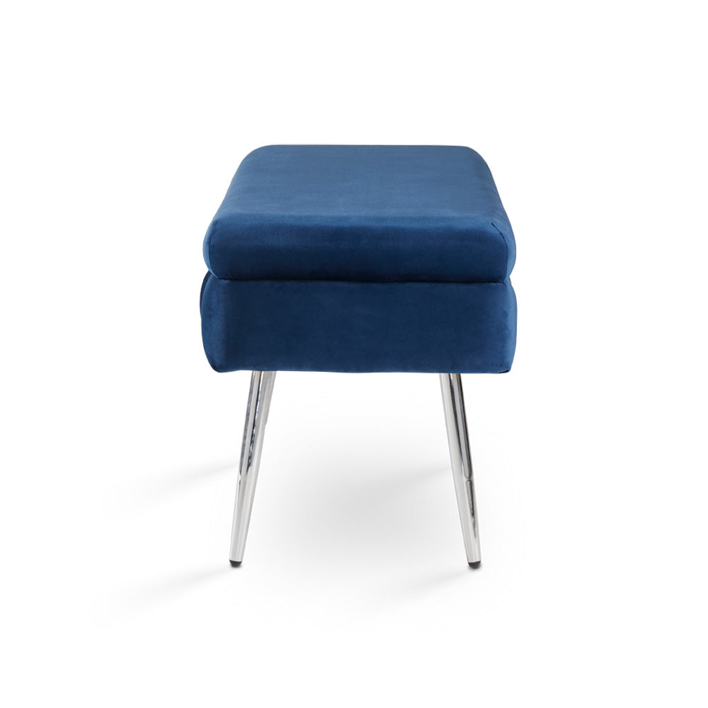 Sleek view of the side profile, highlighting the rich blue velvet fabric and modern chrome legs