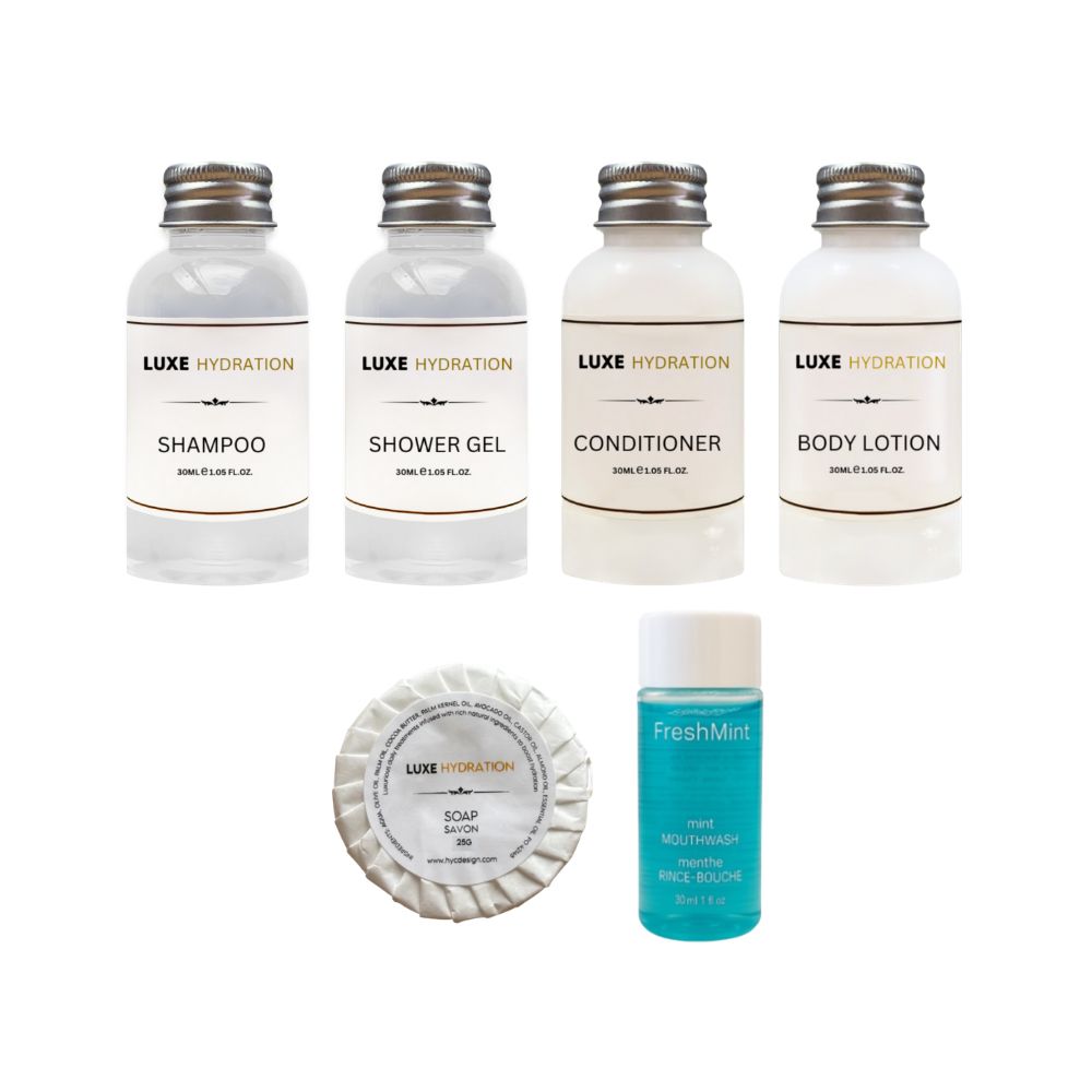 Luxe Hydration 6-piece travel care set with shampoo, shower gel, conditioner, body lotion, wrapped soap and mint mouthwash for trips.
