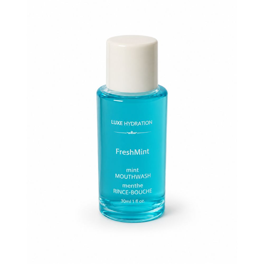 Luxe Hydration FreshMint 30 ml mint mouthwash bottle on a white background, a refreshing travel-size oral care essential.