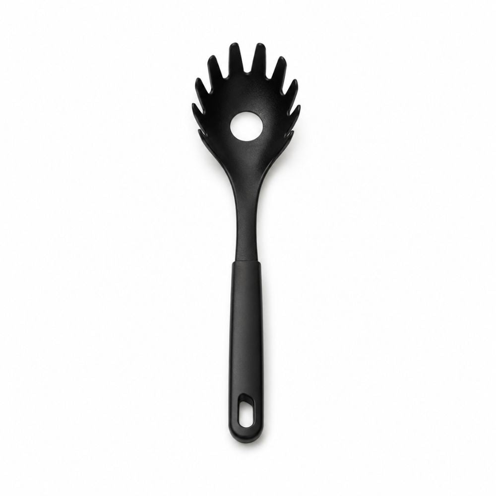 Black pasta server with pronged spoon head, centre draining hole and ergonomic handle for serving spaghetti and noodles.
