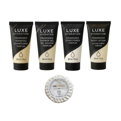 Luxe Hydration 5-piece personal care travel set with fragrance shampoo, shower gel, conditioner, body lotion and wrapped soap.