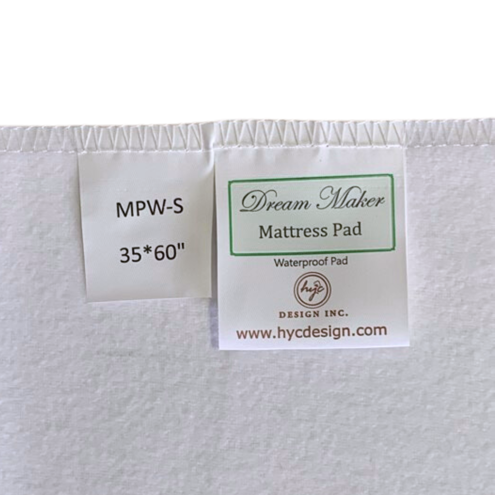 Cotton Waterproof Sheet ( 35x60") / Closer tag view Waterproof king-size mattress protector featuring anti-bacterial technology and decorative multi-coloured patterns for upscale Airbnb stays.