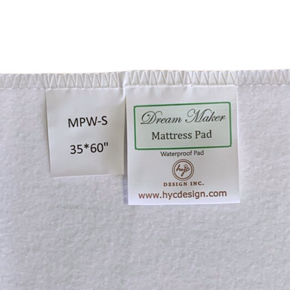 Cotton Waterproof Sheet ( 35x60") / Closer tag view Waterproof king-size mattress protector featuring anti-bacterial technology and decorative multi-coloured patterns for upscale Airbnb stays.
