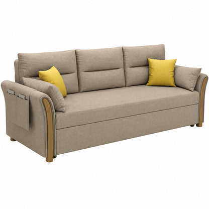 Beige three-seat sofa bed with padded back cushions, long seat cushion, wood-tone arm accents and yellow decorative pillows.