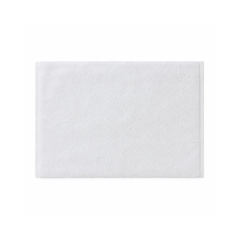 Two soft white bath towels neatly rolled and stacked on a white background, offering a clean, cozy look for any home bathroom.