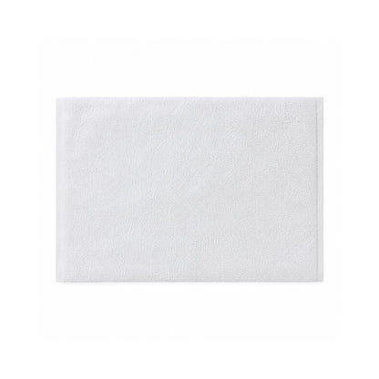 Two soft white bath towels neatly rolled and stacked on a white background, offering a clean, cozy look for any home bathroom.