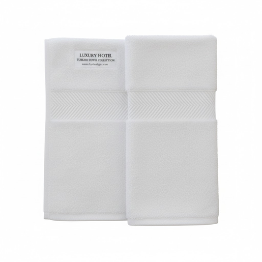 Close-up of hand towel fabric showcasing a smooth, plush texture and durable cotton fibers