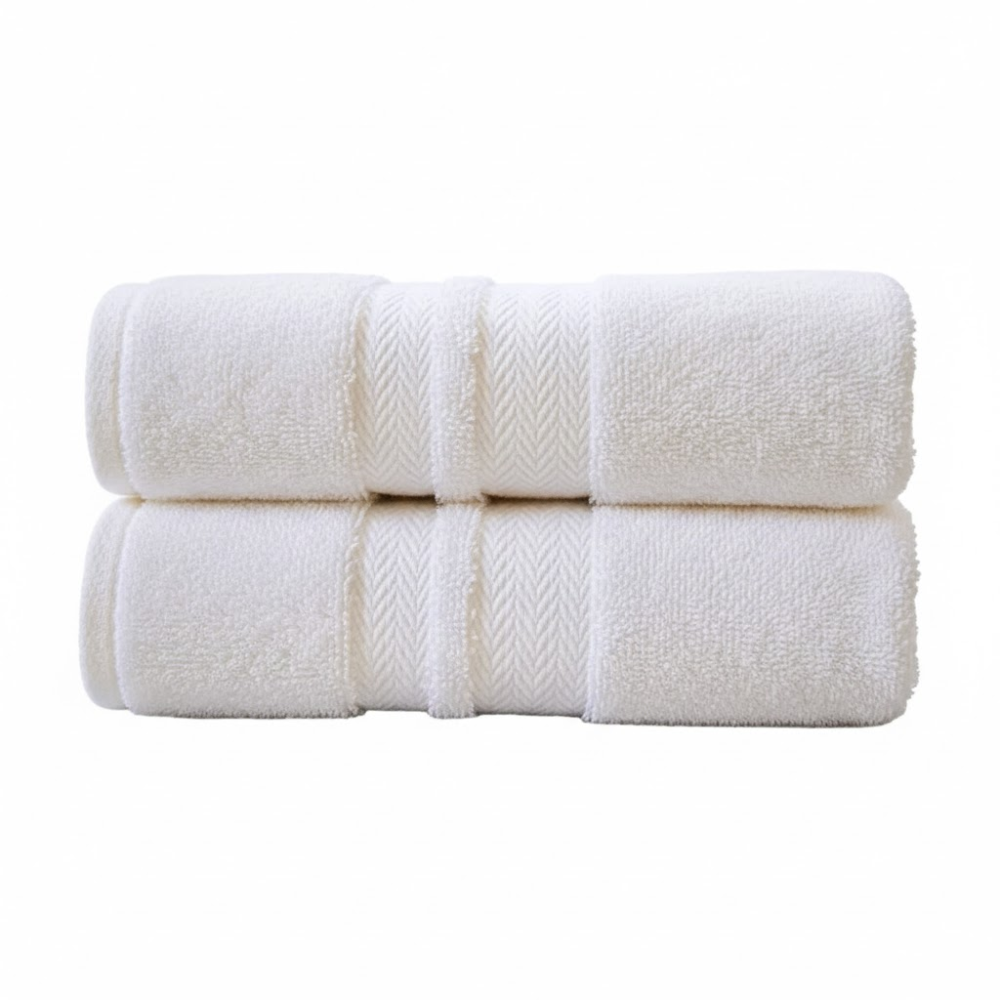 Folded cotton hand towel highlighting a dense weave, smooth finish, and refined, durable construction