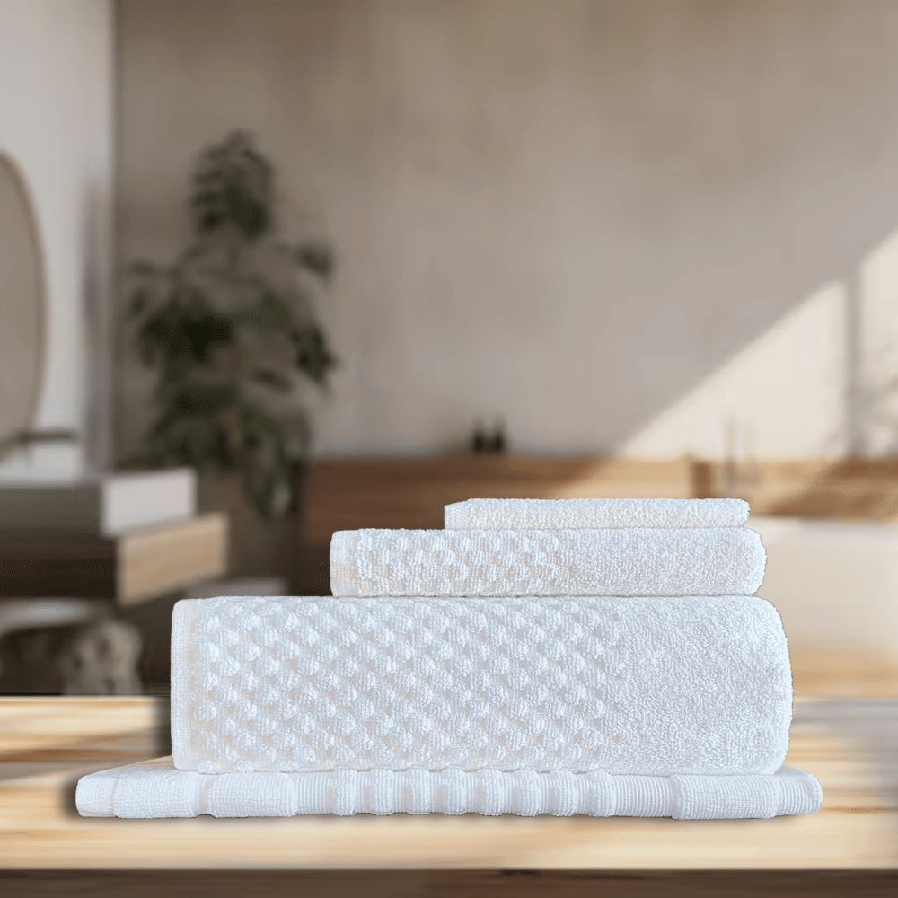 Wholesale elegant hotel towels, designed for both utility and style, meeting the needs of washrooms in rental and hospitality spaces. DT Series Towel Set - 4 Pc Background