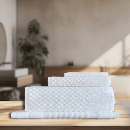 Wholesale elegant hotel towels, designed for both utility and style, meeting the needs of washrooms in rental and hospitality spaces. DT Series Towel Set - 4 Pc Background