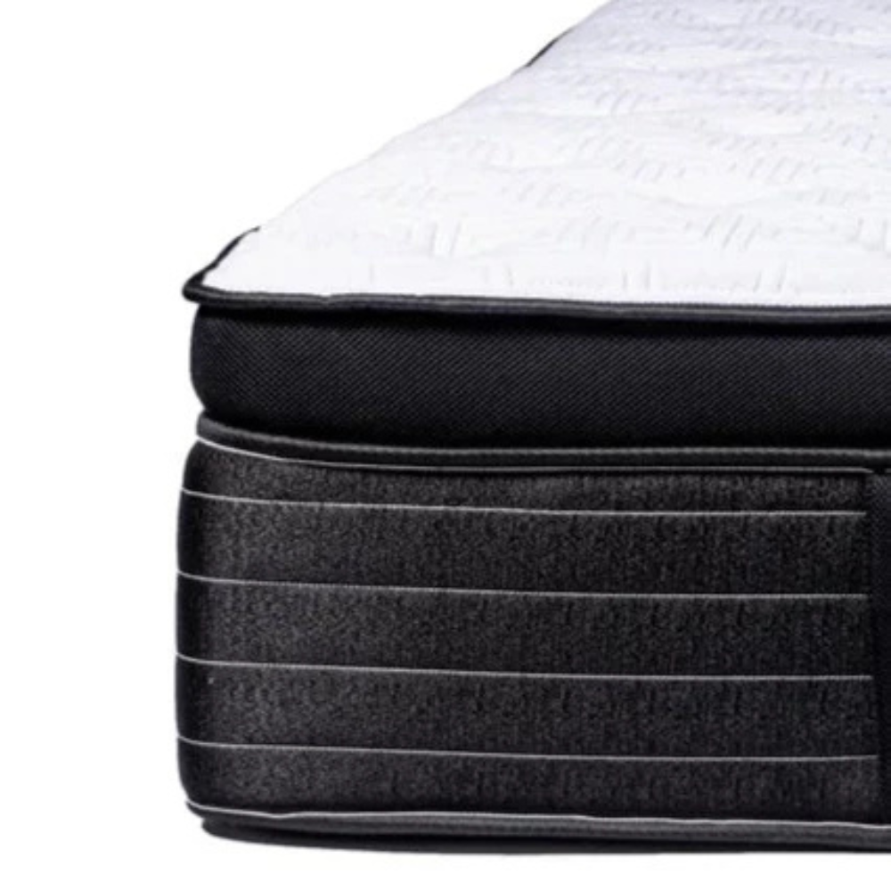edge of the savoy mattress showing its thickness
