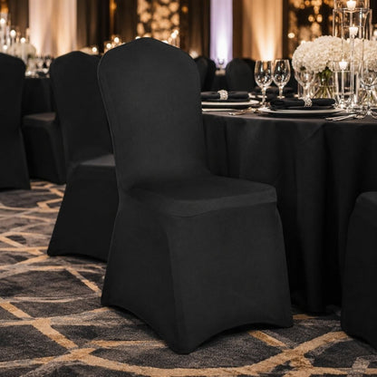 Black stretch banquet chair cover styled in a formal event setting, ideal for receptions, celebrations and sophisticated dining décor.