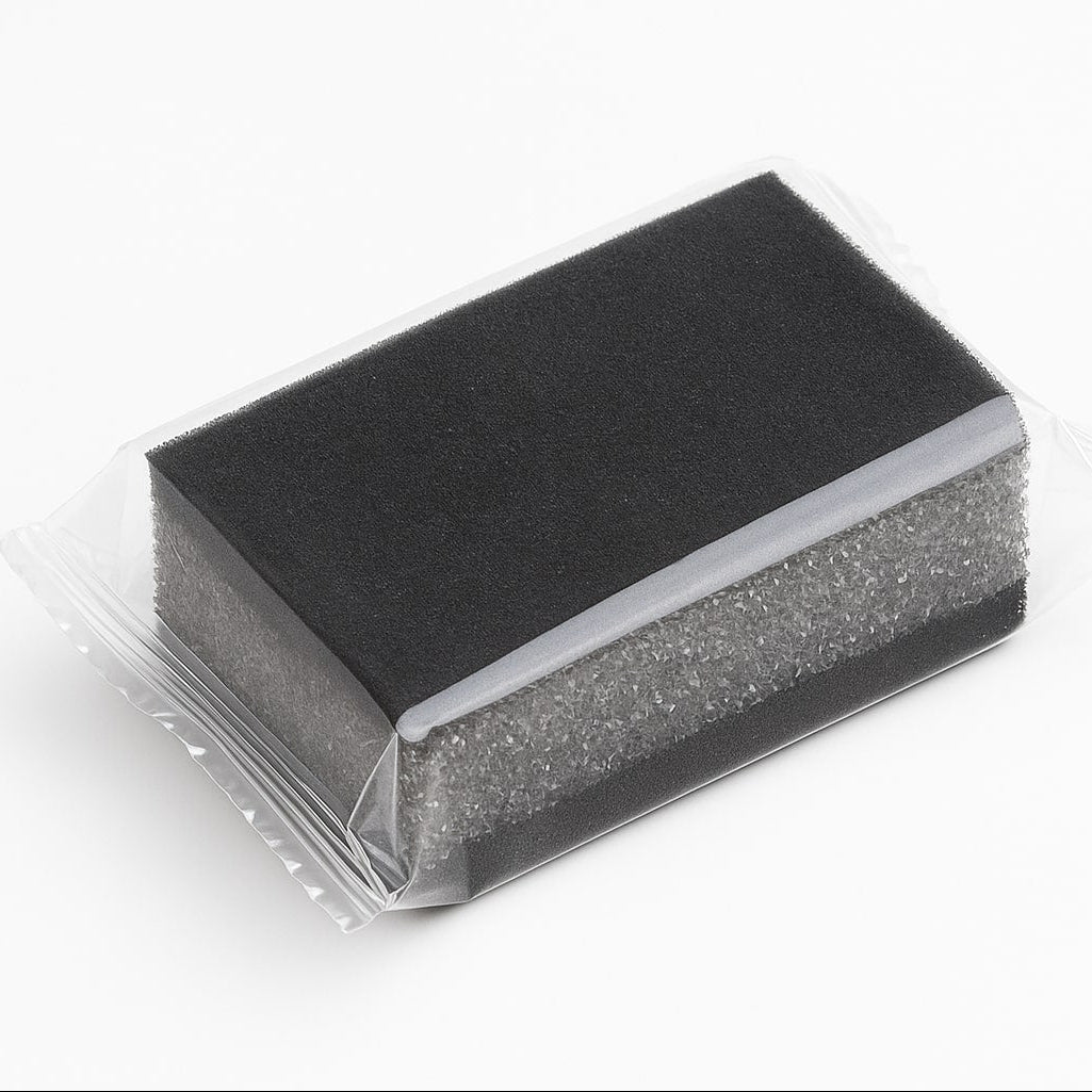 Hotel shoe shine sponge, pre-treated and individually packed for instant leather polish, ideal for guest amenities.