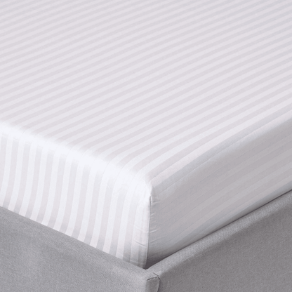 Durable bed sheet with smooth finish, designed for comfort and long-lasting use in residential and hospitality settings