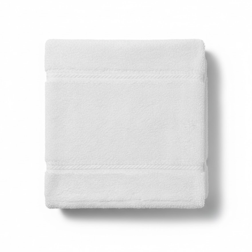 Close-up of a cotton washcloth highlighting its herringbone pattern and smooth, absorbent texture