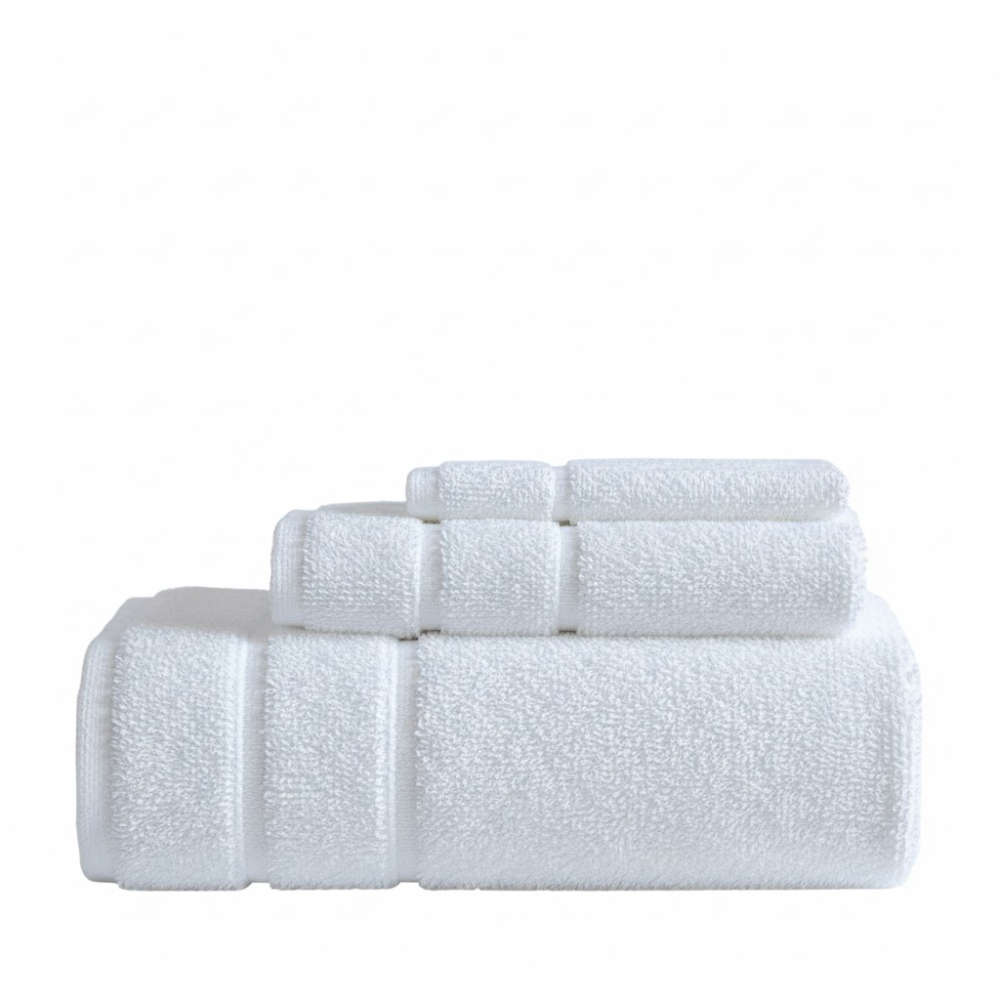 Plush cotton towels arranged neatly, offering exceptional softness and a refined, luxurious bathroom look