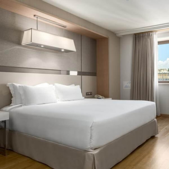 premium quality flat sheet made from a cotton and polyester blend ideal for hotels and vacation rentals 