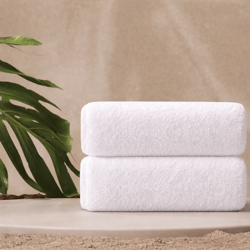 White bath towel displayed neatly, highlighting a clean look and dependable absorbency for daily use