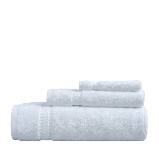 Plush cotton bath towels neatly folded, showcasing a soft texture, high absorbency, and a clean, classic design