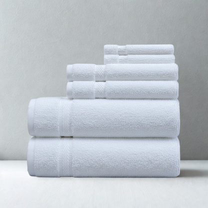 Folded cotton bath towel with a smooth finish and classic dobby border for an elegant touch
