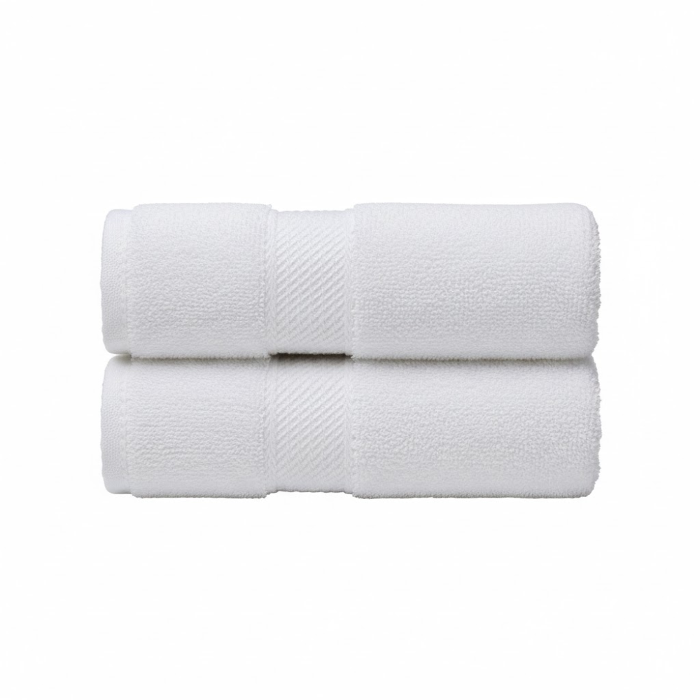 Plush white bath towels with a soft, absorbent texture and a refined single-side border for an elegant bathroom look