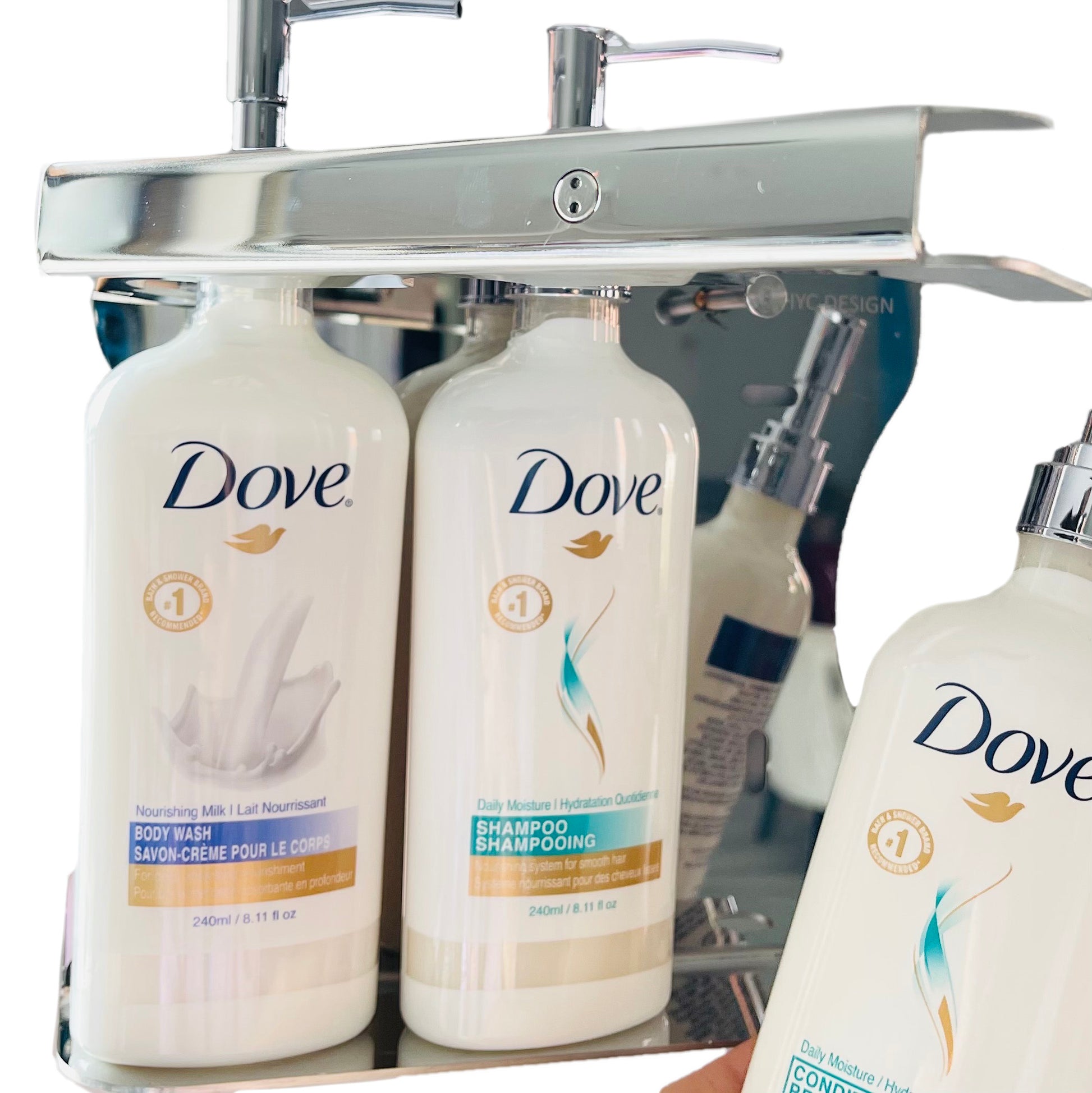 Dove body wash, conditioner and shampoo in a liquid amenities holder