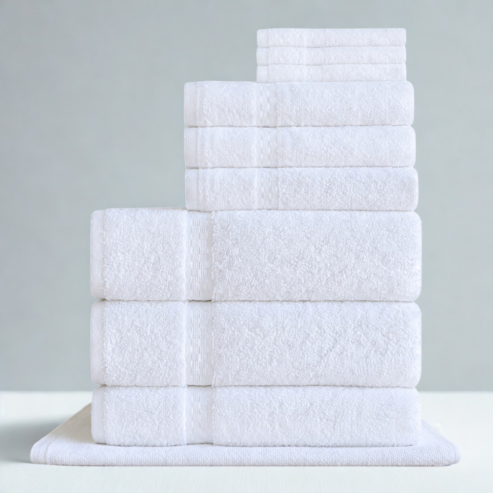 Towels styled in a modern bathroom setting to create a refined, welcoming guest experience
