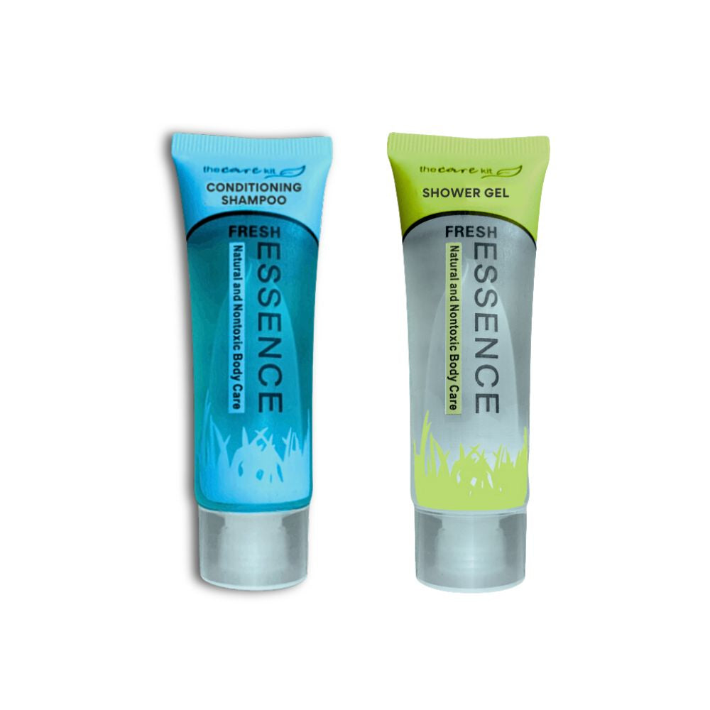 Fresh Essence conditioning shampoo and shower gel hotel amenity tubes on a white background