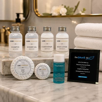Luxe Hydration 8-piece personal care set with shampoo, shower gel, conditioner, body lotion, soaps, mint mouthwash and makeup wipe.
