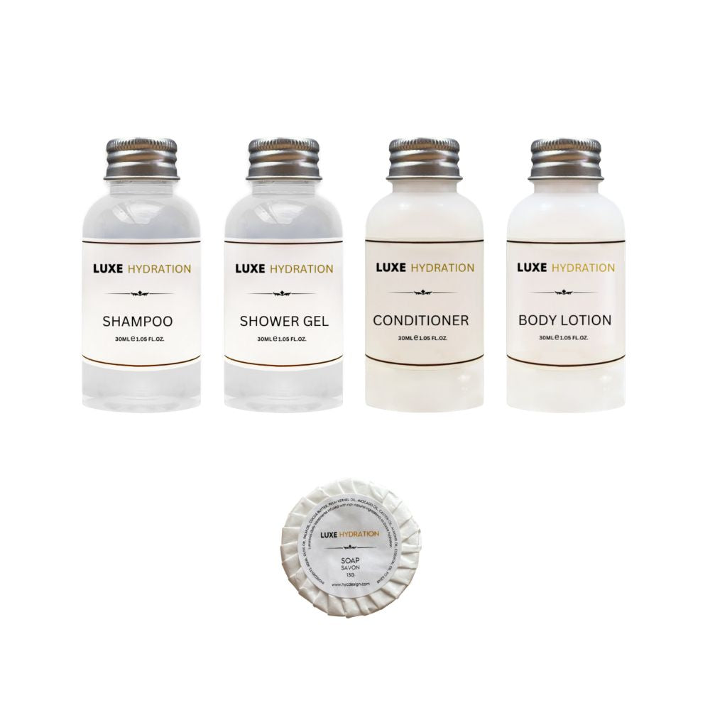 Luxe Hydration 5-piece travel toiletry set with 30ml shampoo, shower gel, conditioner, body lotion and 13g soap for personal care.