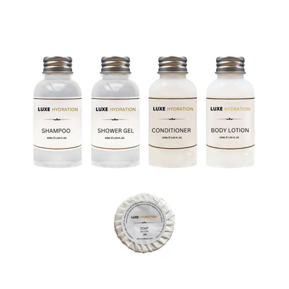 Luxe Hydration 5-piece travel toiletry set with 30ml shampoo, shower gel, conditioner, body lotion and 25g soap for personal care.
