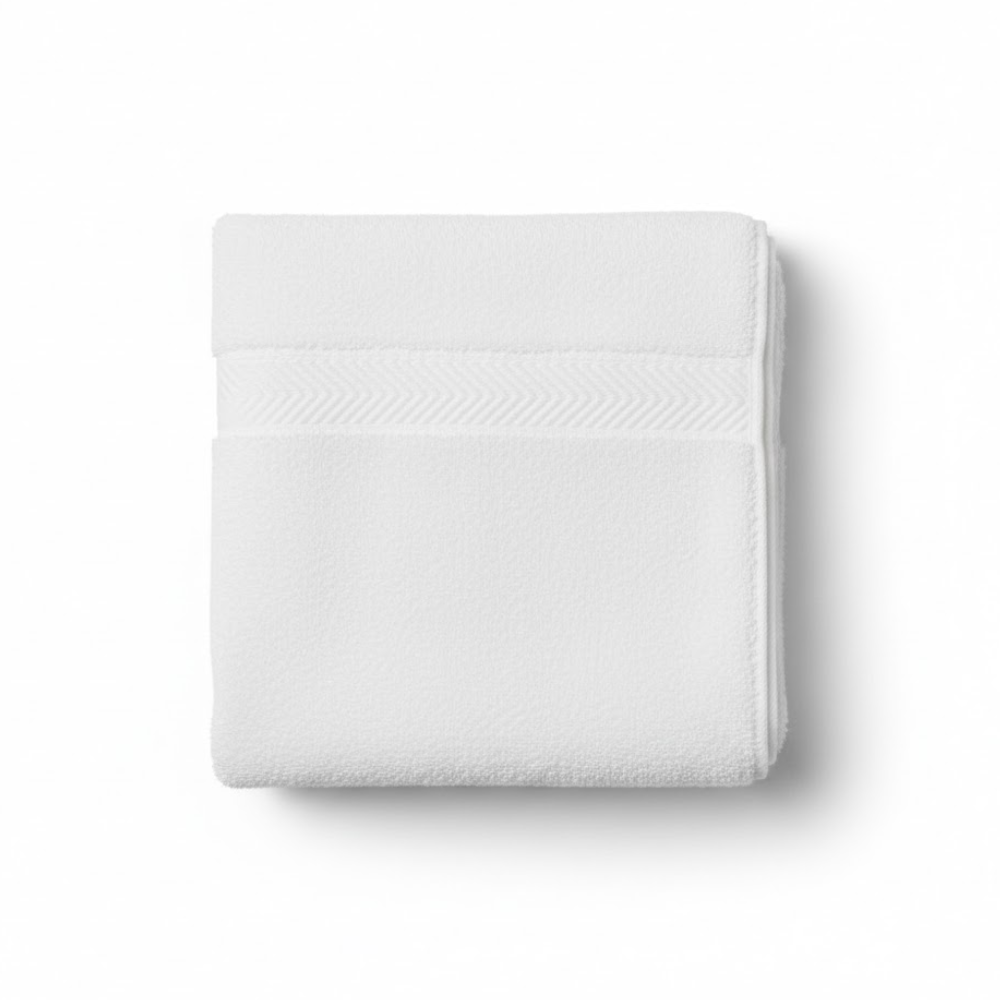 Plush cotton washcloth displayed flat, showcasing a refined weave and a clean, spa-inspired look
