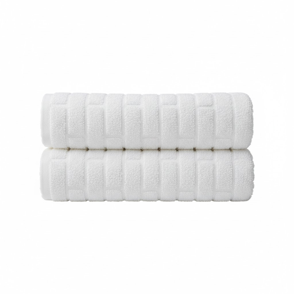 Oversized cotton bath sheet with a plush texture, designed for superior absorbency and a luxurious drying experience