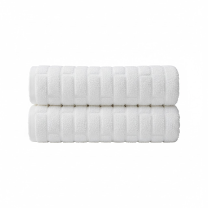 Oversized cotton bath sheet with a plush texture, designed for superior absorbency and a luxurious drying experience